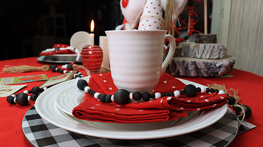 White Cup Atop Matching Dinnerware
