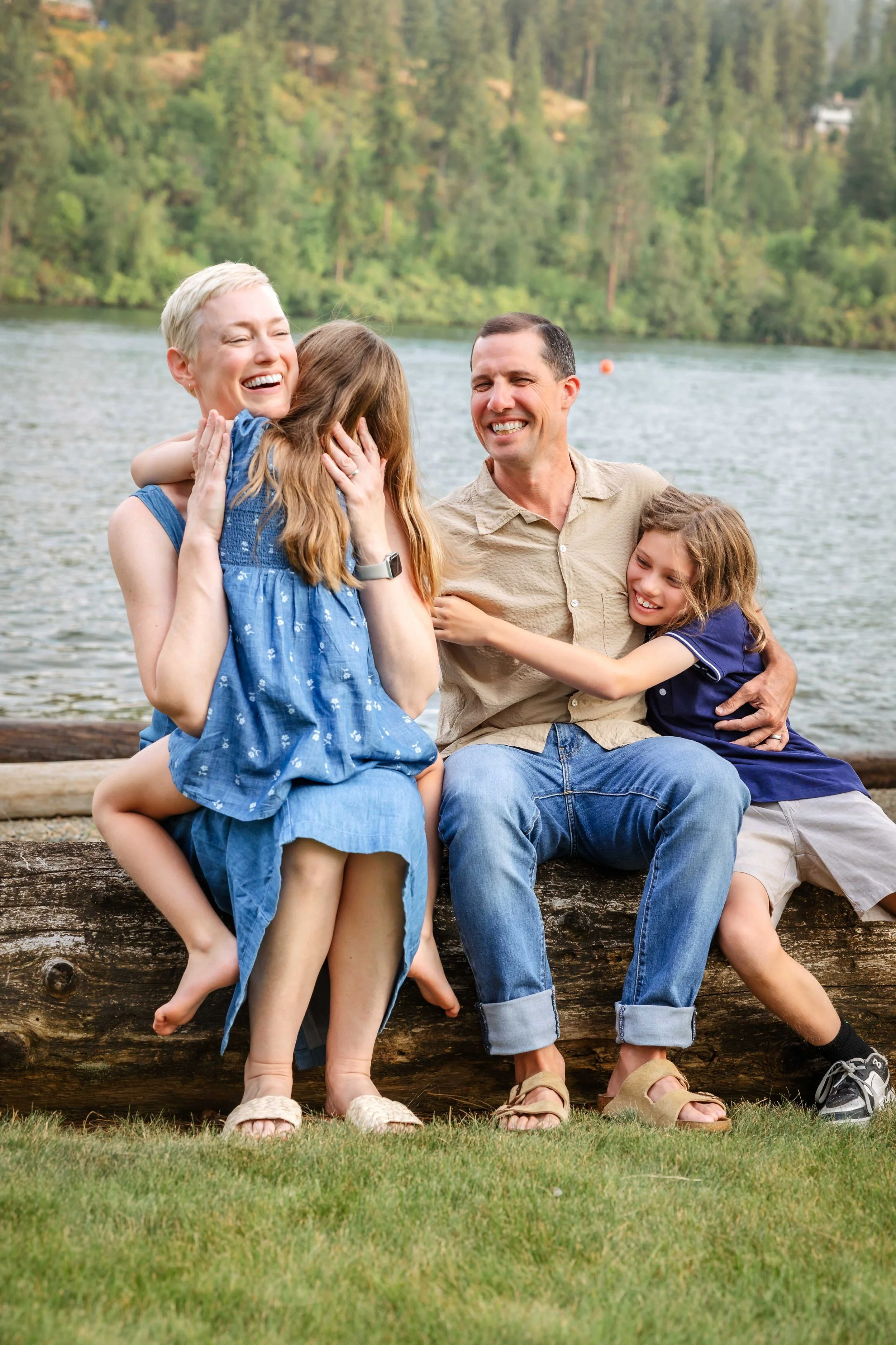 Joyful Family portraits on Spokane river on vacation