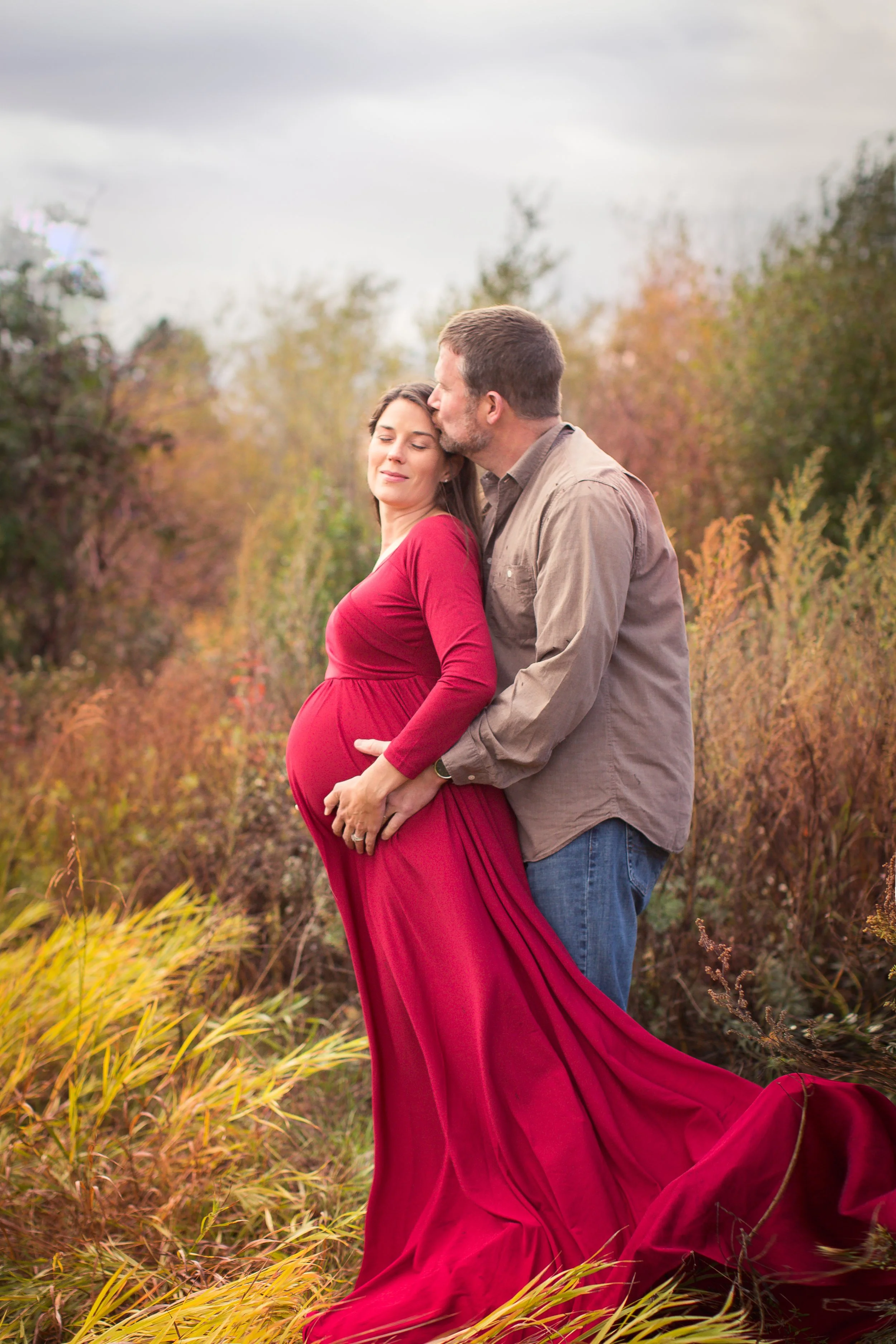 An intimate maternity detail capturing the deep love and anticipation shared between parents and their baby.