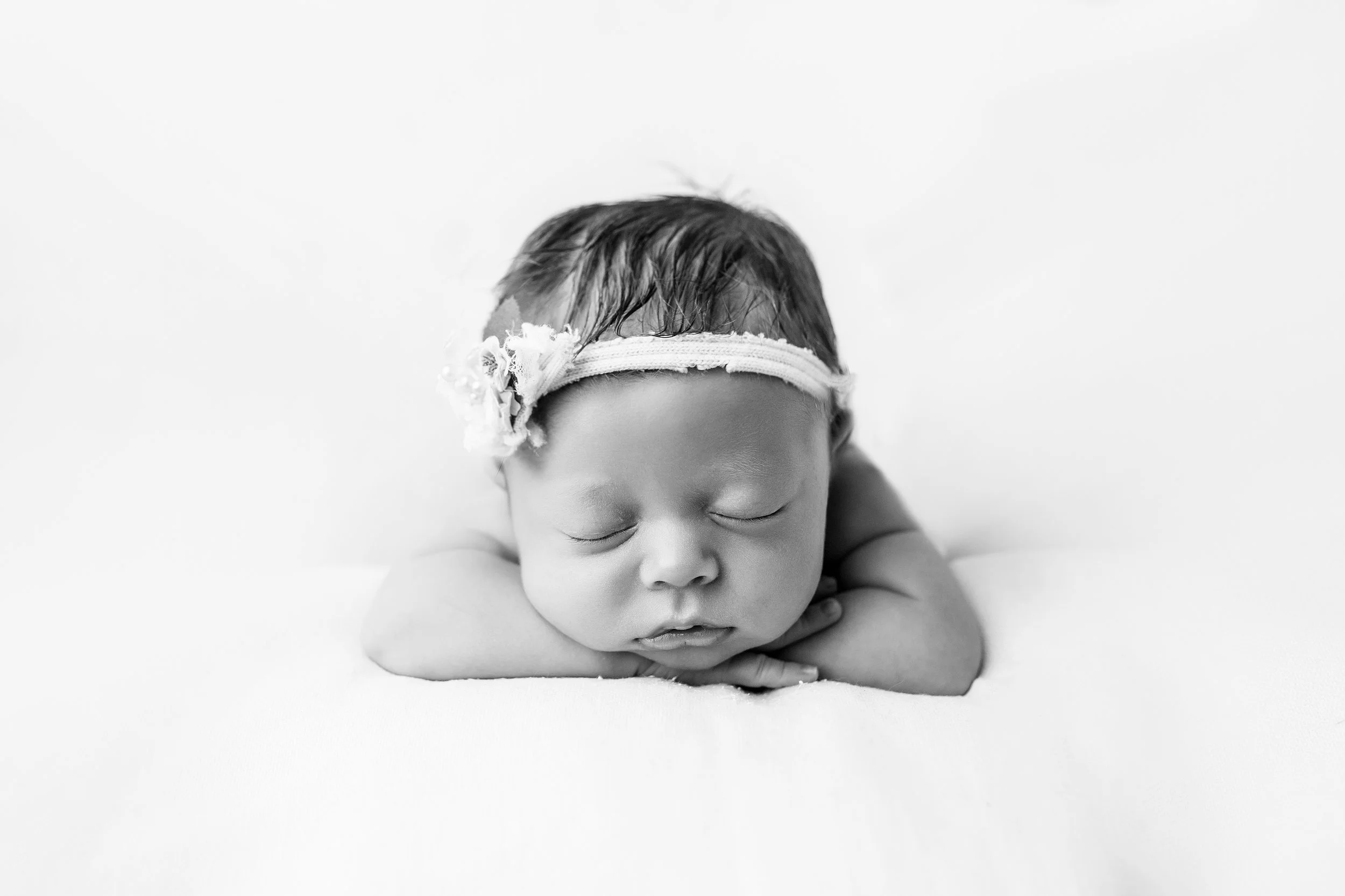 newborn session Athol Idaho posed in sleeping pose