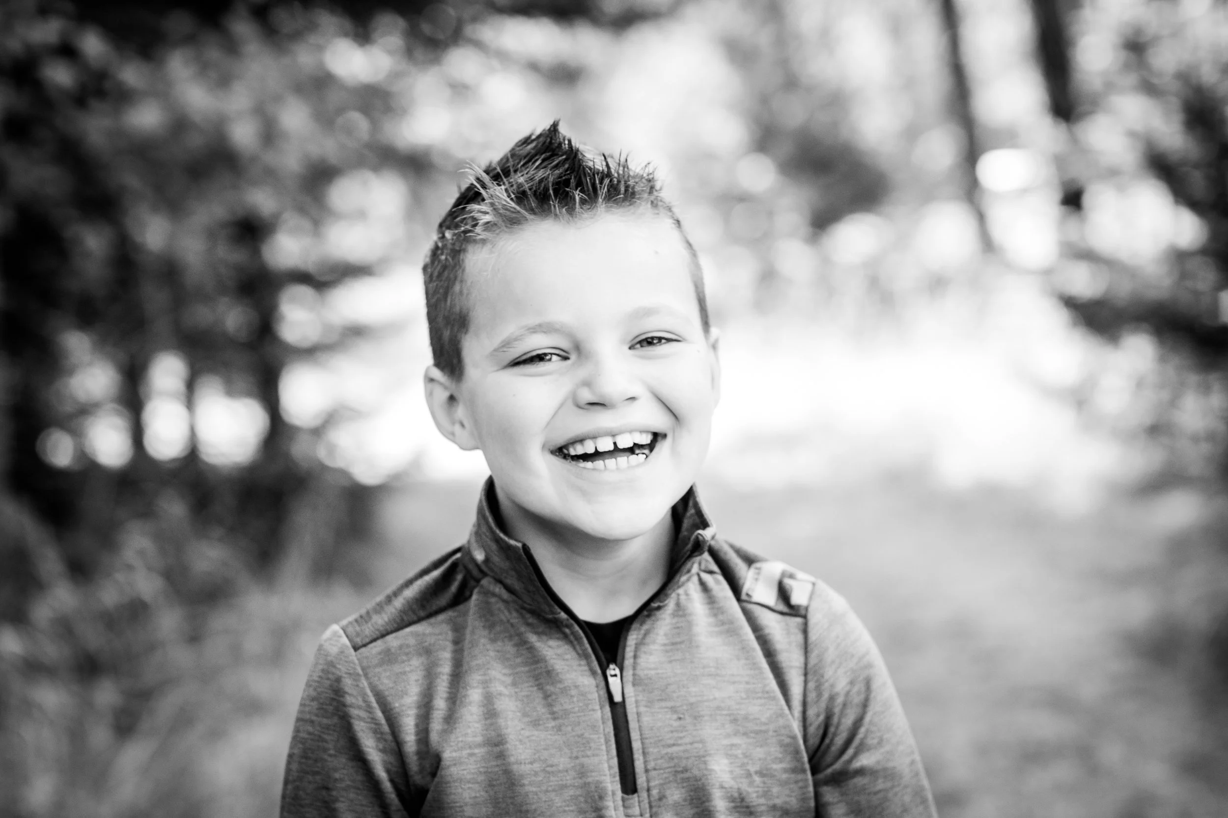 Smiling candid school portrait outdoors in Hayden Idaho