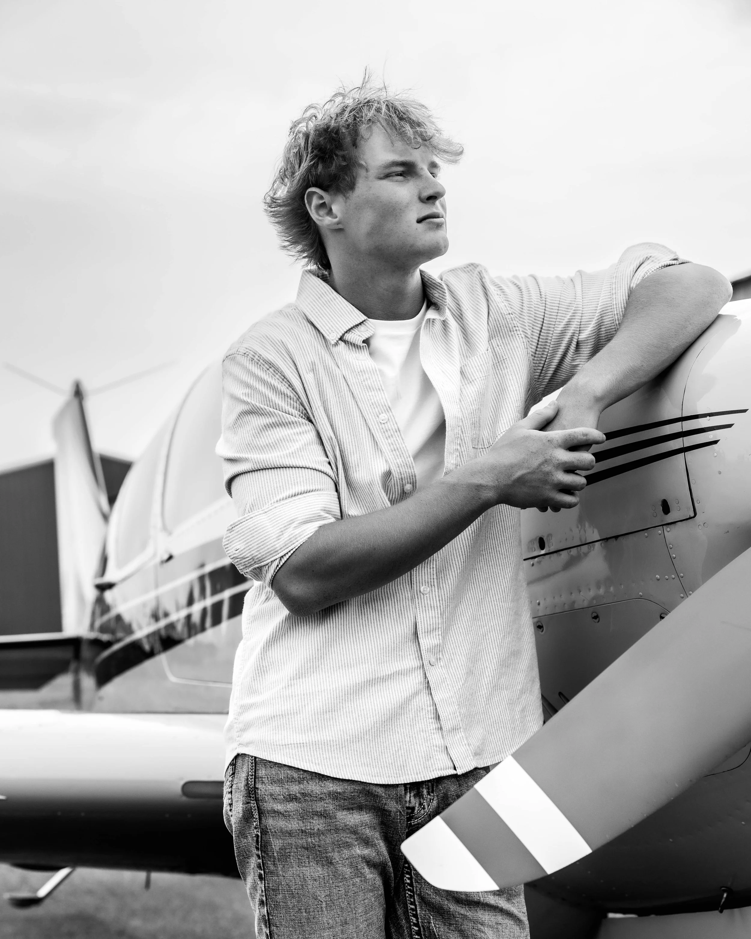 senior photos Coeur d’Alene outdoor portrait airplane