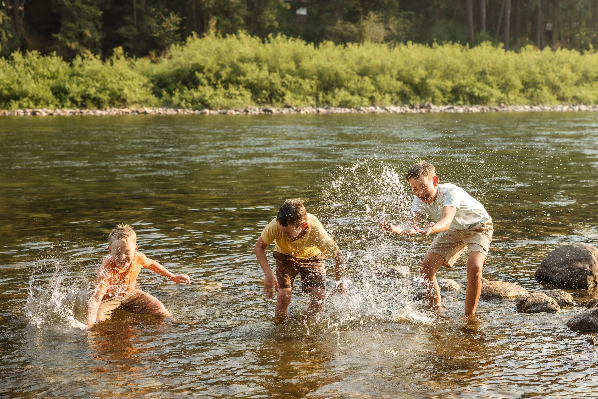 Family photography session in Coeur d’Alene Idaho at sunset capturing natural connection and emotion