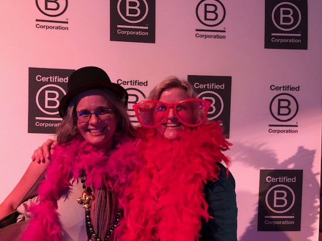 Rhonda Morton and I get decked out at the B Corp Champions Retreat in New Orleans