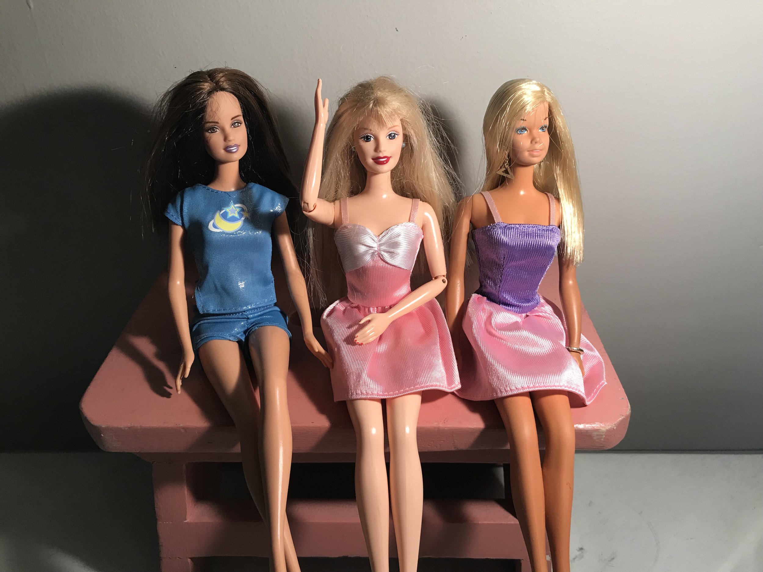 We stan an icon! (Two of the few Barbies that made it out of my youth with their hairstyles intact, and my mom’s Barbie from the 70s.)