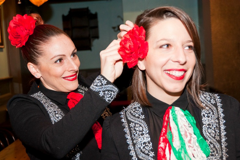 Mickela Mallozzi, right, has a costume adjustment before filming an episode of Bare Feet in New York City.