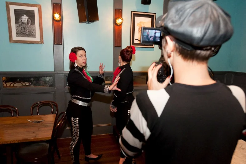 Mallozzi gives direction to her crew during filming.