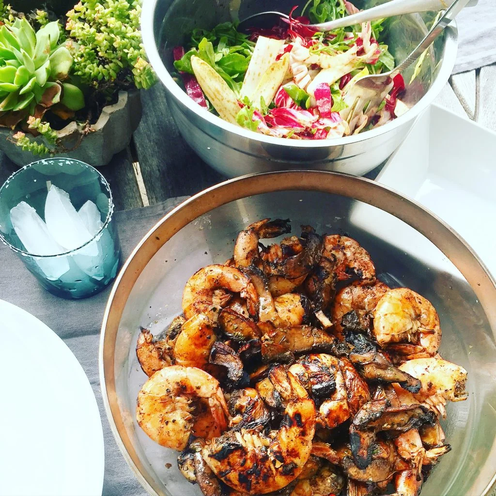 Another easy simple summer meal is peel and eat shrimp! I take shrimp with the shells on, marinate in olive oil, lemon a splash of balsamic vinegar, garlic, salt & pepper for an hour. Then I just throw it on the grill. Also try throwing fresh parsley on top after grilling for a brighter finish.