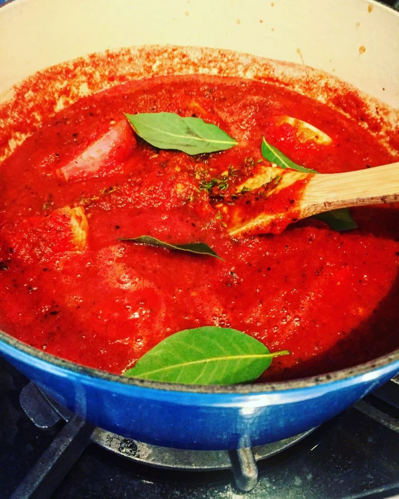 Another important component to a great pizza is the sauce! I keep mine really simple with Whole San Marzano tomatoes pureed and I simmer with 1 whole onion, a couple cloves of garlic, a quarter cup of olive oil, bay leaves and fresh oregano. Season with a little salt and pepper.