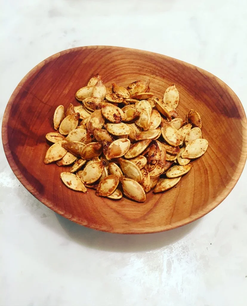 After we scooped and carved out pumpkins I quickly roasted and seasoned the seeds. Love using these for salads and snacking!