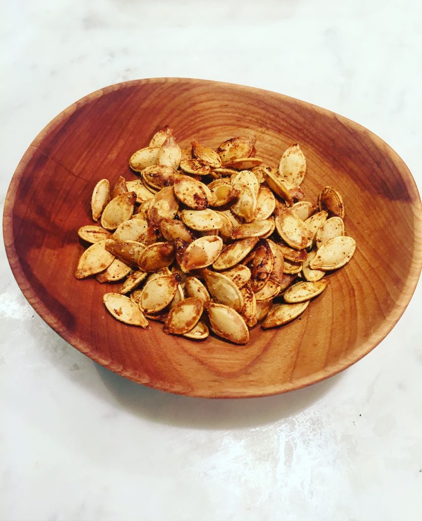After we scooped and carved out pumpkins I quickly roasted and seasoned the seeds. Love using these for salads and snacking!