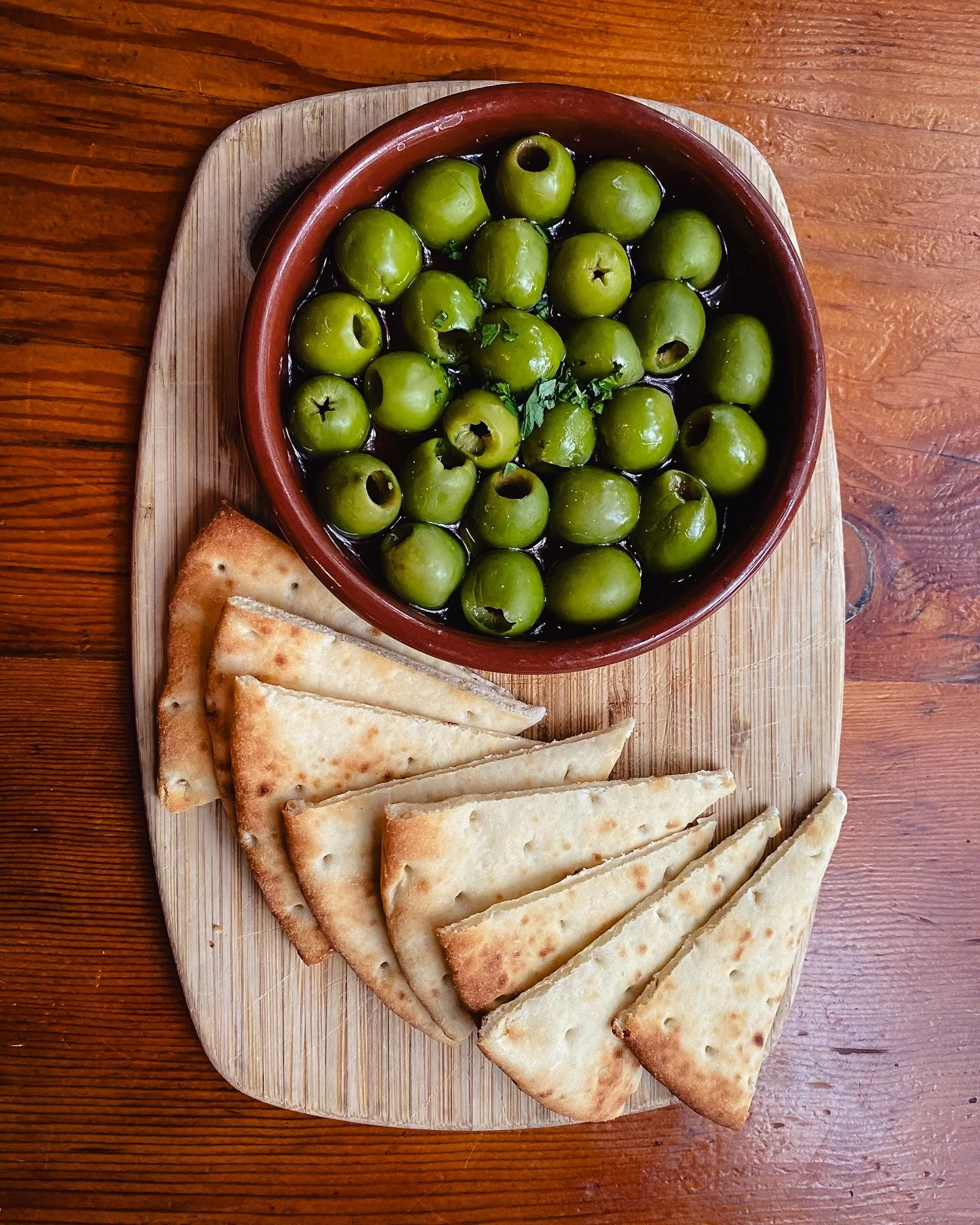 It’s going to be a wet one out there this weekend, so stay dry and let us do the pouring. 
Start with our Castelvetrano Olives π« warm, buttery, baked in herb oil, and served with soft pita bread.