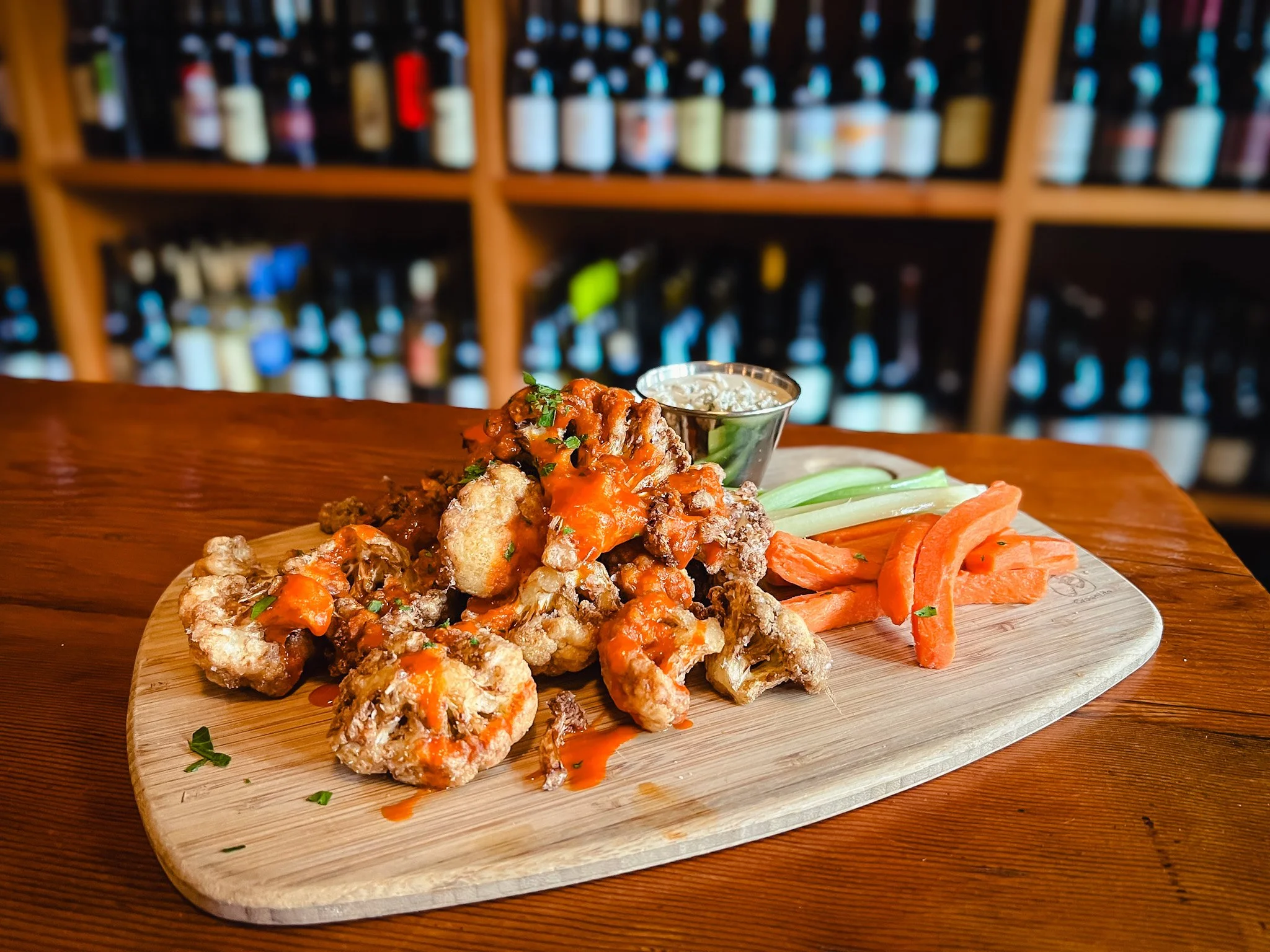 Tuesday’s calling for the Buffalo Cauliflower! 
Fried cauliflower tossed in buffalo sauce with celery, carrots and your choice of ranch or blue cheese.