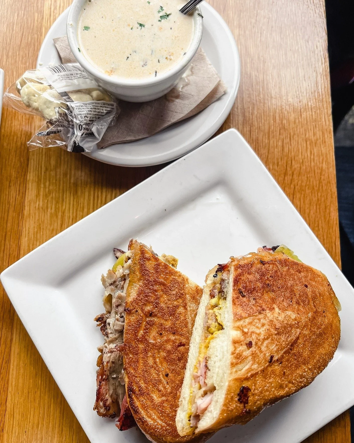 Thursday called for a classic.

The Cubano with house-roasted pork, smoked ham, Swiss, pickles, and yellow mustard on a grilled roll.

Pair it with a cup of soup and call it good. 

Current Soups:
Clam Chowder (last day)
Beef Chili (GF &amp;DF) toppe