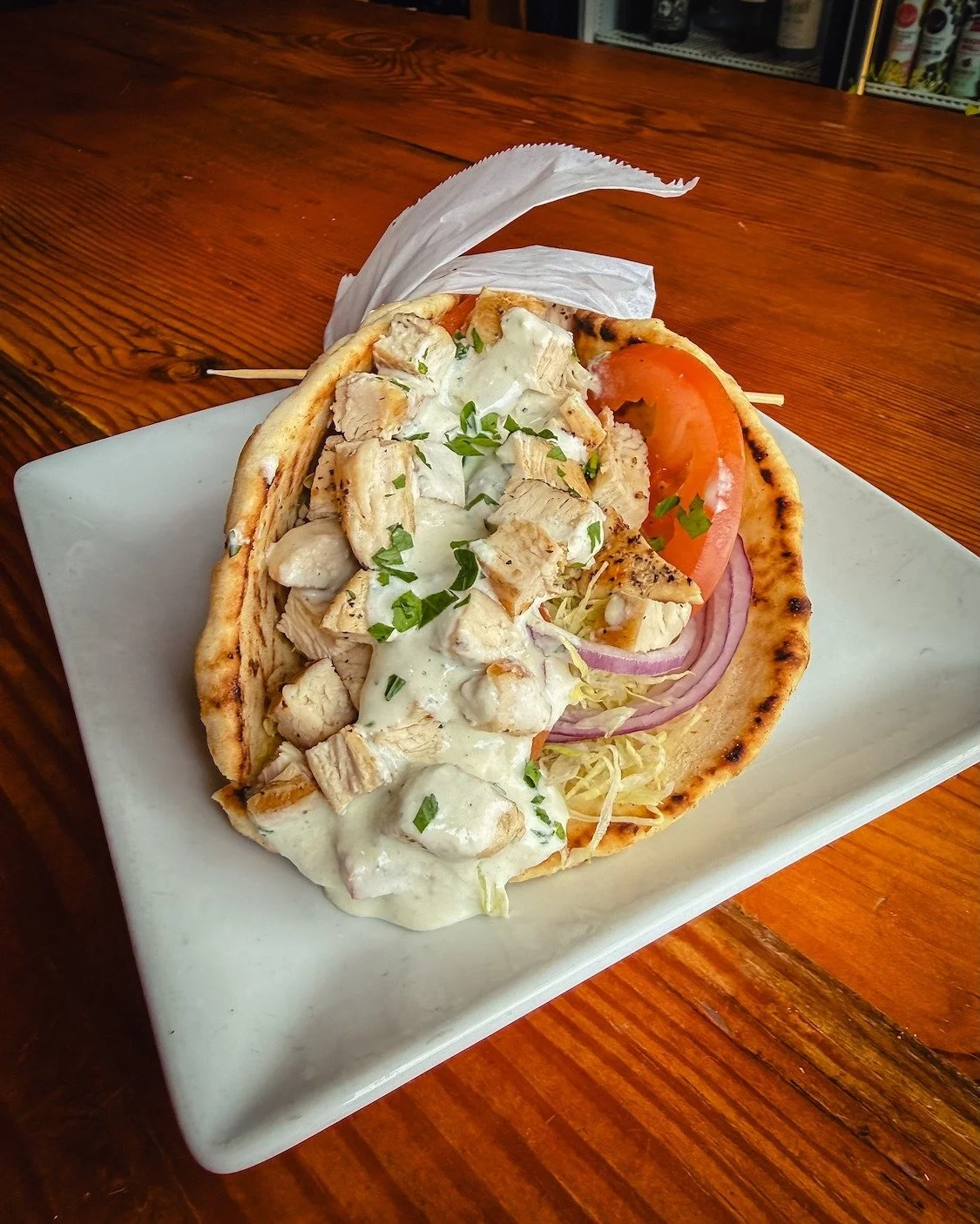 A new weekly special is here and it's a good one:

The Chicken Gyro 🥙
Grilled chicken breast, red onions, tomatoes, shredded lettuce, and tzatziki, all tucked into a warm pita. Fresh, filling, and just messy enough to mean it&rsquo;s good.

Grab one