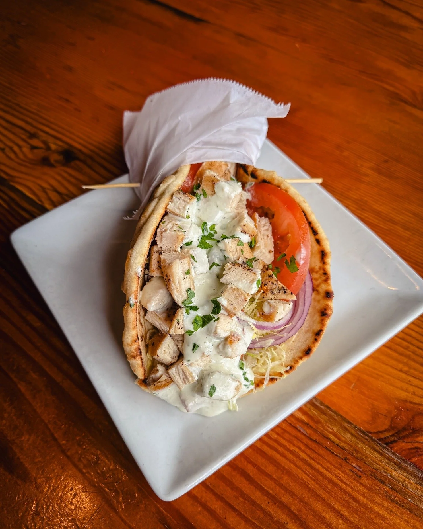 Good news! The Chicken Gyro special is sticking around this week. 🙌

Grilled chicken breast piled into warm pita with red onions, tomatoes, shredded lettuce, and a generous swipe of tzatziki. It&rsquo;s fresh, a little messy in the best way, and exa