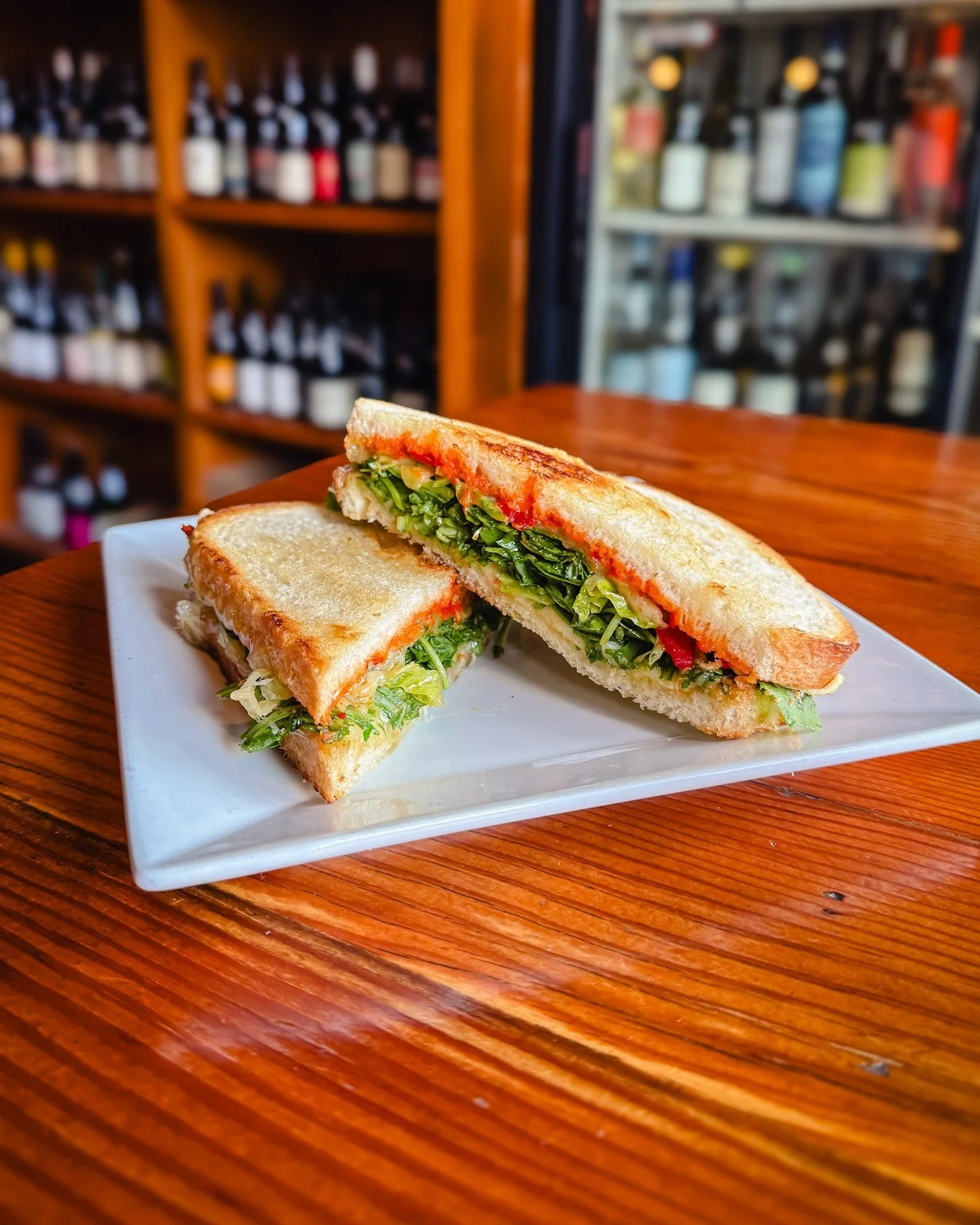The Veggie Grilled Cheese. Gruyere, arugula, pepper spread, and roasted tomato aioli on sourdough.

Simple, melty, and always a solid choice.