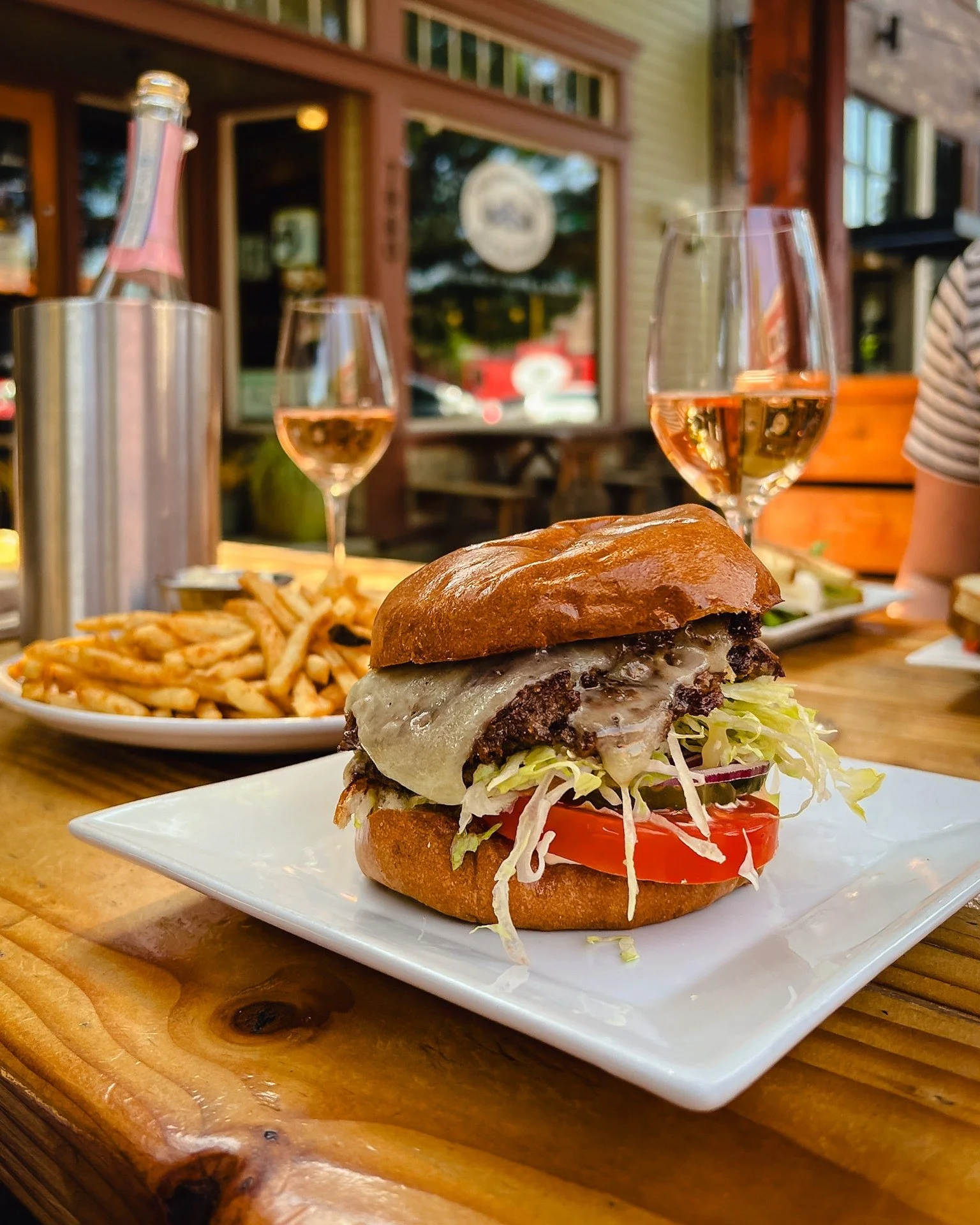 Soak up this beautiful weather on the patio with a Smash burger, fries, and a bottle to share.