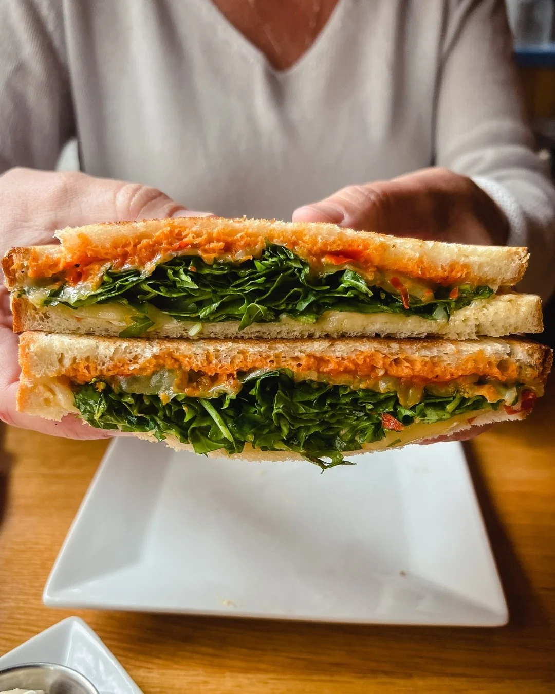 The Veggie Grilled Cheese 🥪

Gruy&egrave;re, arugula, pepper spread, and roasted tomato aioli, pressed until golden on sourdough or gf bread. (v)

This is not your average grilled cheese. The gruy&egrave;re gets melty, the arugula brings a little bi