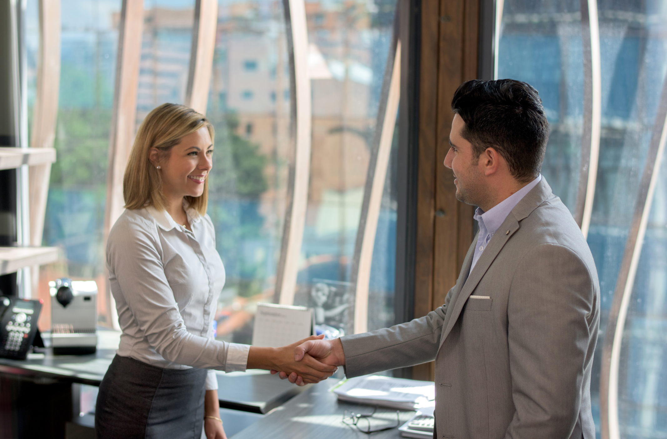 Communication Man Woman Shaking Hands.jpg