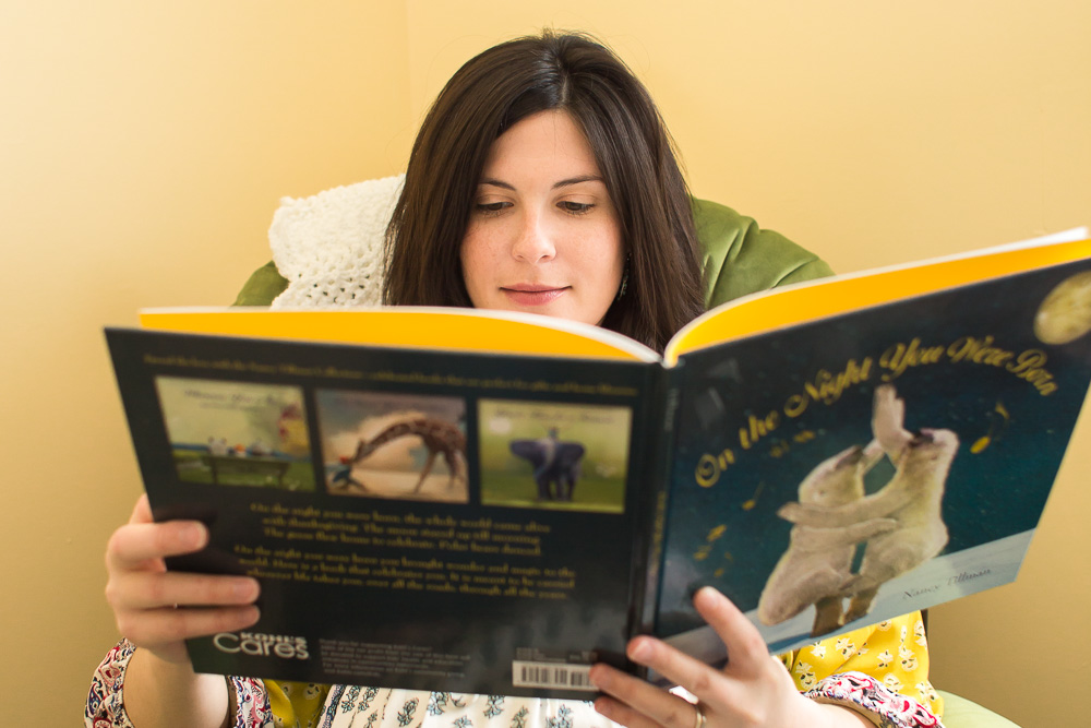 Mom reading “On the Night You Were Born” | Rochester, NY Maternity Photos