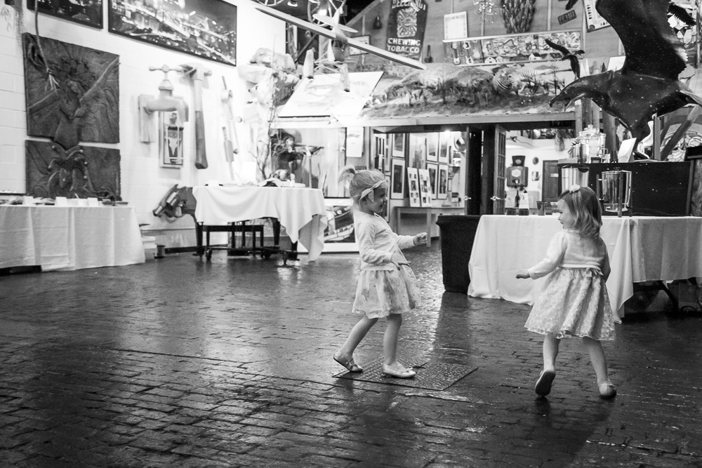 Flower girls having fun running around the venue
