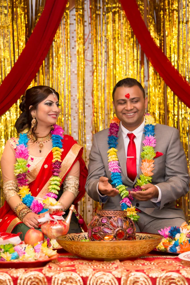 Bride and groom during their Nepali engagement ceremony
