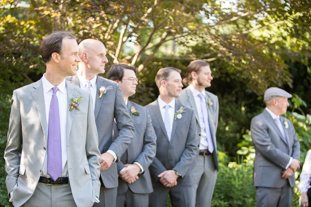 Groom watching his bride walk down the aisle at Airlie | Warrenton Virginia Weddings