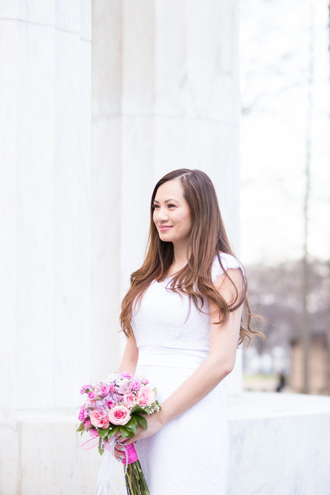 Stunning bride with her bouquet from Twin Towers Florist | DC War Memorial Wedding | Megan Rei Photography