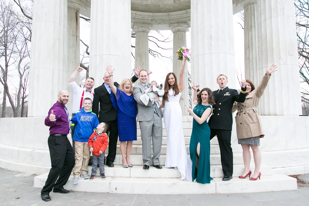 All of the happy wedding guests celebrating with the bride and groom | DC War Memorial Wedding Photography | Megan Rei Photography