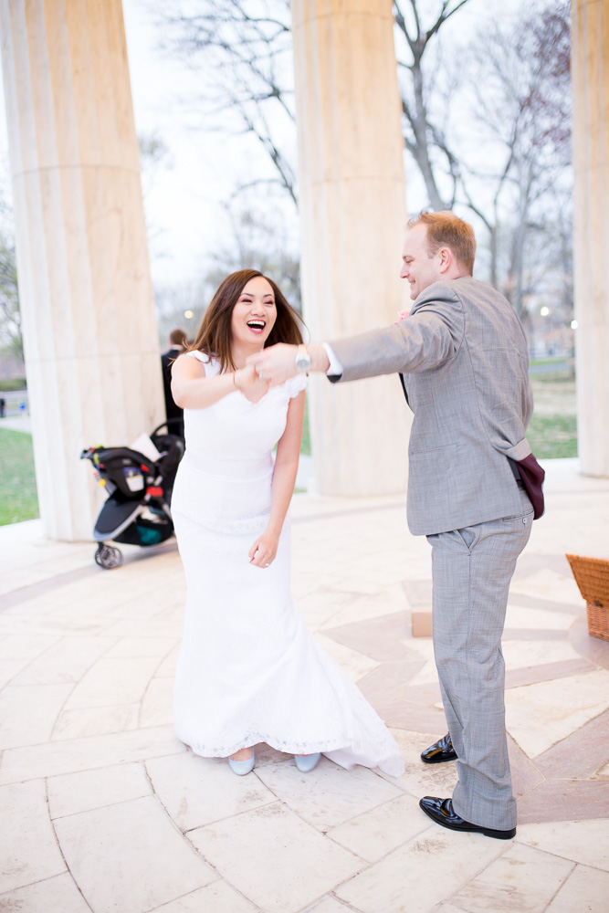 Husband and wife enjoying their first dance at the DC War Memorial | Northern Virginia Wedding Photographer | Washington, DC | Megan Rei Photography