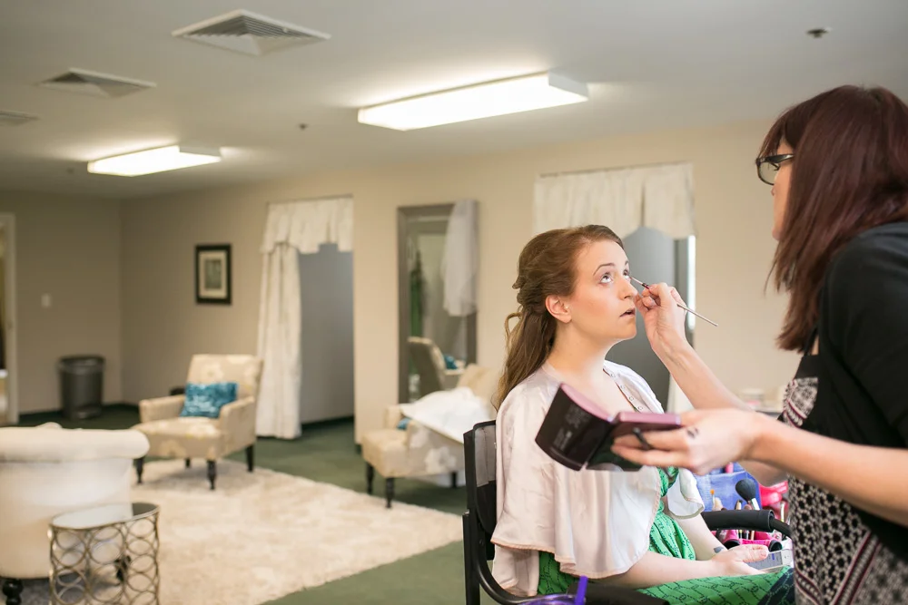 Bride getting ready at Evergreen Country Club | Megan Rei Photography
