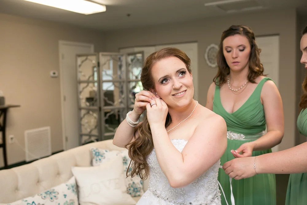 Bride getting ready in the bridal suite at Evergreen Country Club | Virginia Wedding Photographer | Megan Rei Photography
