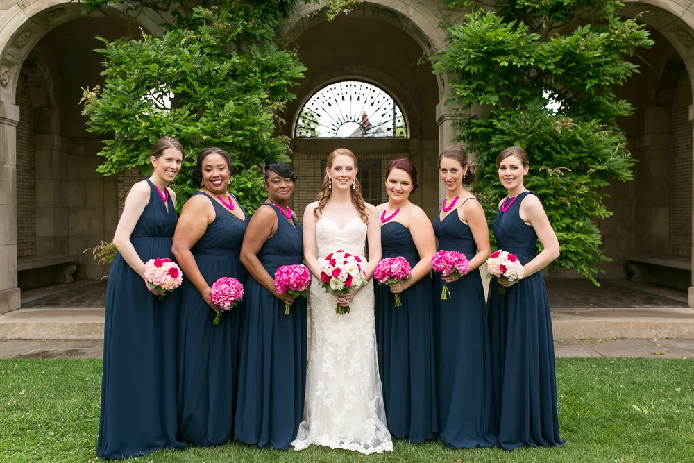 Bridesmaids in front of the arches at the George Eastman Gardens | Upstate New York Wedding Photography