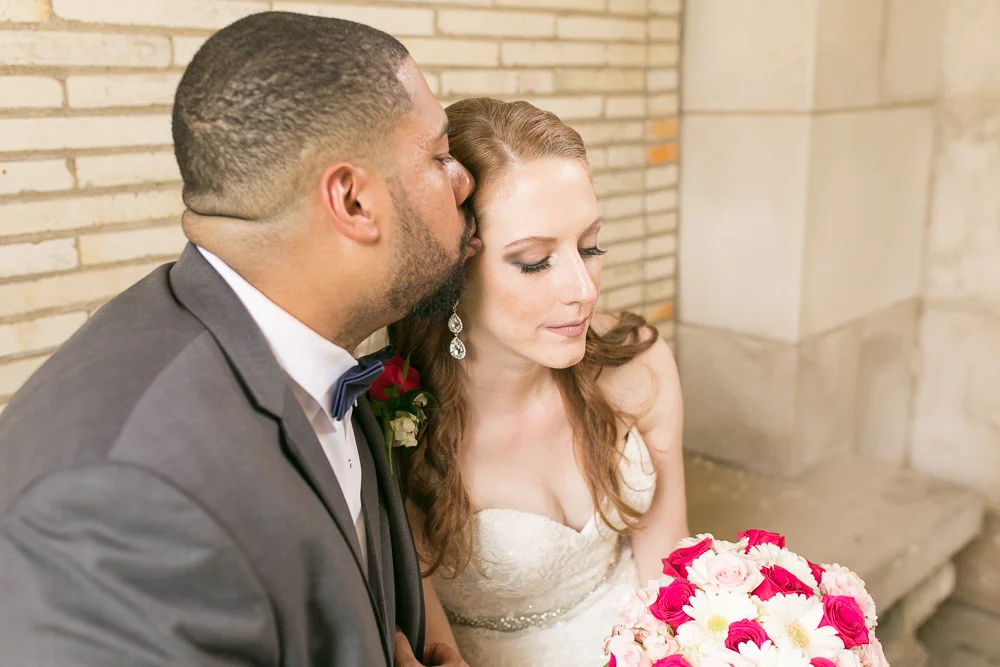 Groom giving bride a kiss at George Eastman Museum | Best Places for Wedding Photos in Rochester, NY | Megan Rei Photography