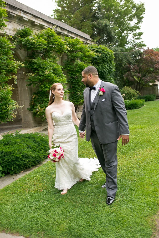 Bride and groom walking through the George Eastman Gardens | Best Rochester Wedding Photography | Megan Rei Photography