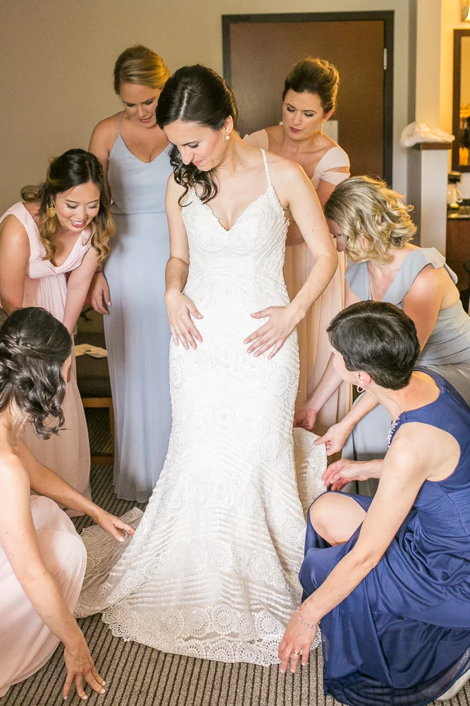 Helping the bride put on her wedding dress | Northern Virginia Winery Wedding | Documentary Style Photographer in Washington, DC