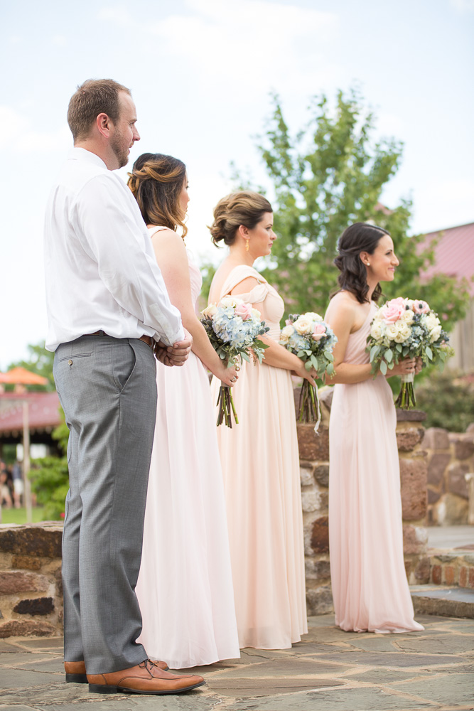 Bridal party watching the wedding ceremony | Summer wedding in Northern Virginia