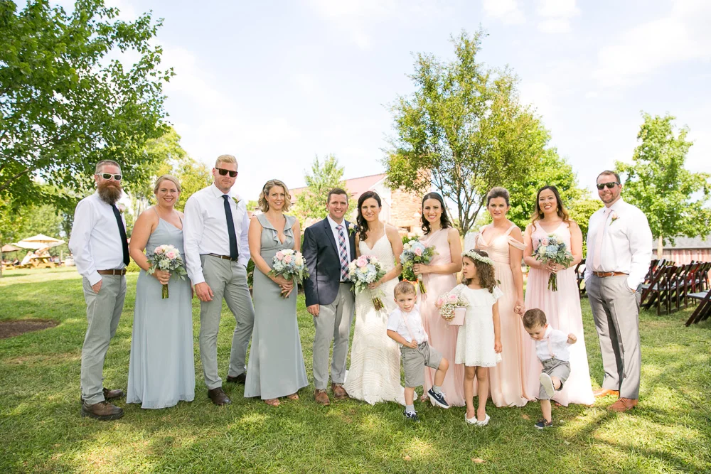 Bridal party posing in front of the Hillwood Ruins | Centreville, VA Outdoor Wedding Venue