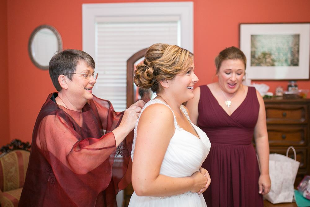Bride putting on her dress | Candid Wedding Photographer in Northern Virginia| Megan Rei Photography