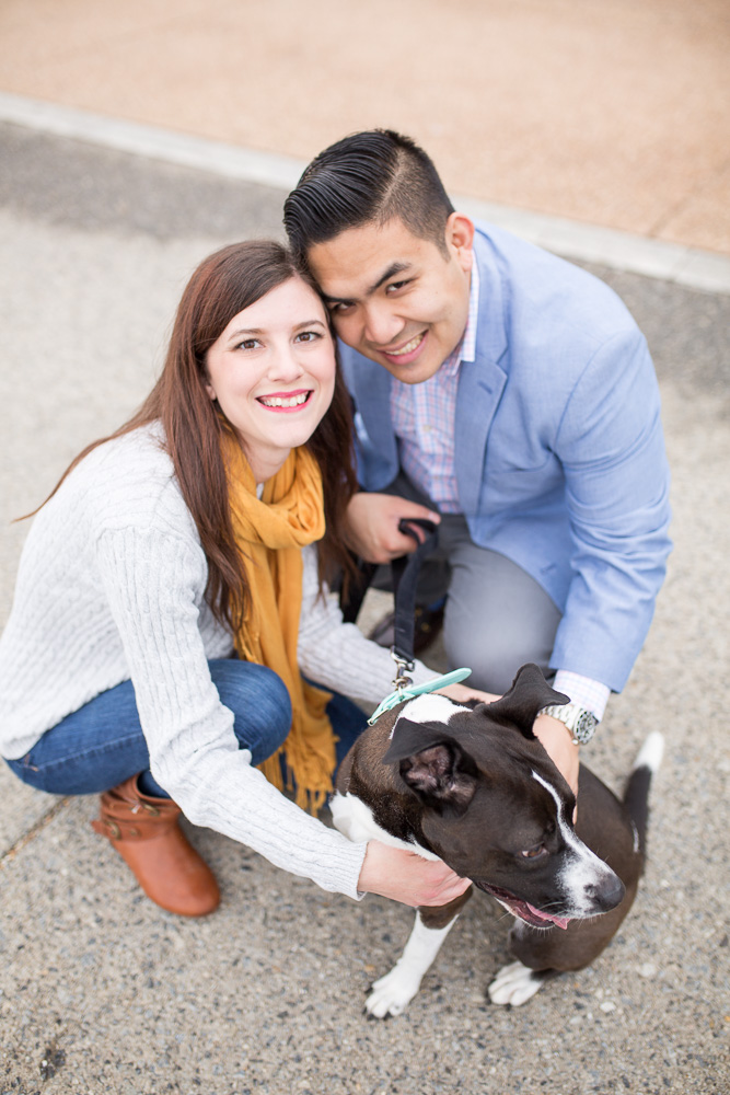 Smiling up at the camera while dog is distracted | DC Engagement Photography