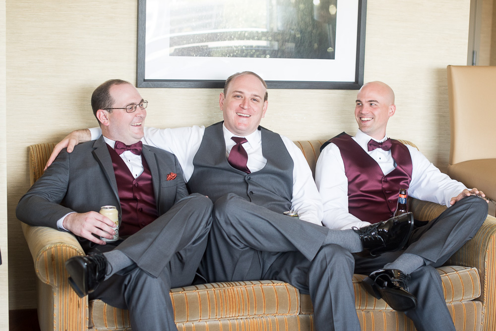 Groom hanging out with his groomsmen at the Westin Washington Dulles | Herndon, Virginia Wedding Photography