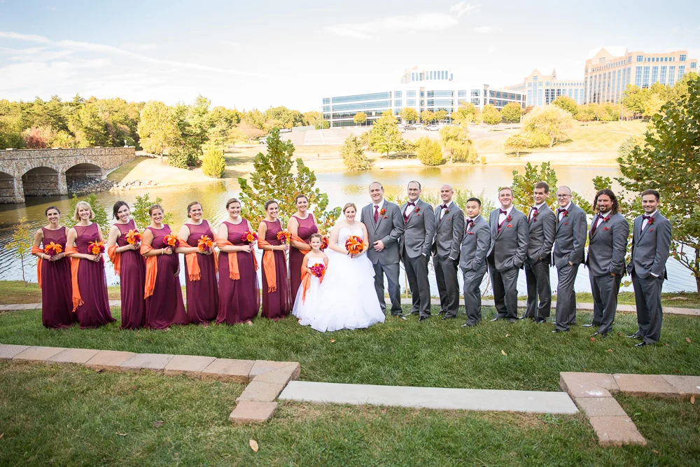 Bride and groom with their wedding party on a sunny day at the Westin Washington Dulles Airport Hotel