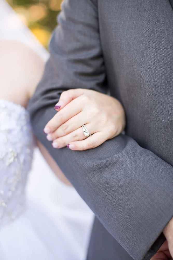 Close up photo of bride's rings