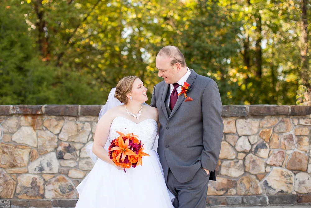 Bride and groom on the stone bridge at the Westin Washington Dulles | Wedding Venues in Northern Virginia
