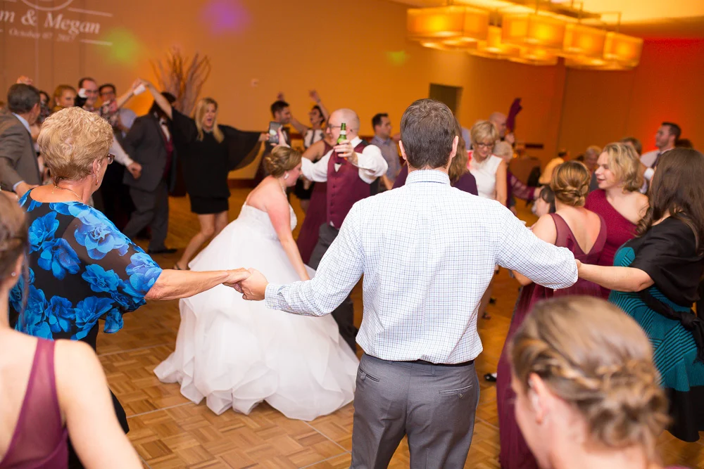 Candid and fun dancing picture from Virginia Tech Hokies wedding