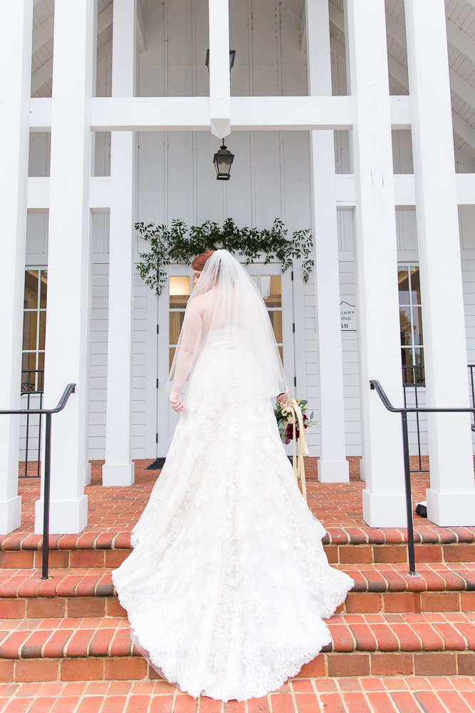 Bridal gown from The Castle Prom and Bridal on the steps of Shady Grove UMC - Short Pump