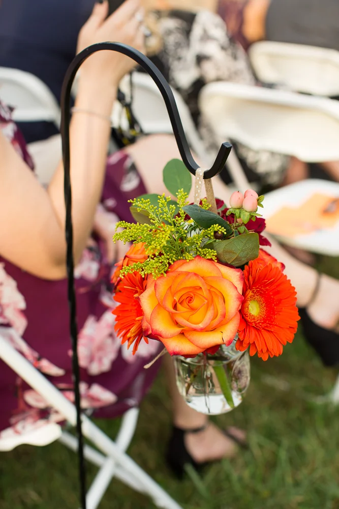 Wedding décor for ceremony from Melanie’s Florist in Haymarket, Virginia