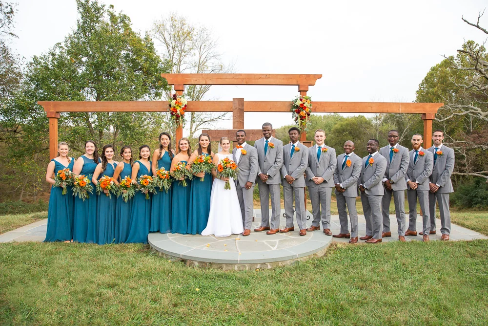 Wedding party photo at the outdoor ceremony site at Mountain Run Winery | Rustic wedding venue in Culpeper, Virginia