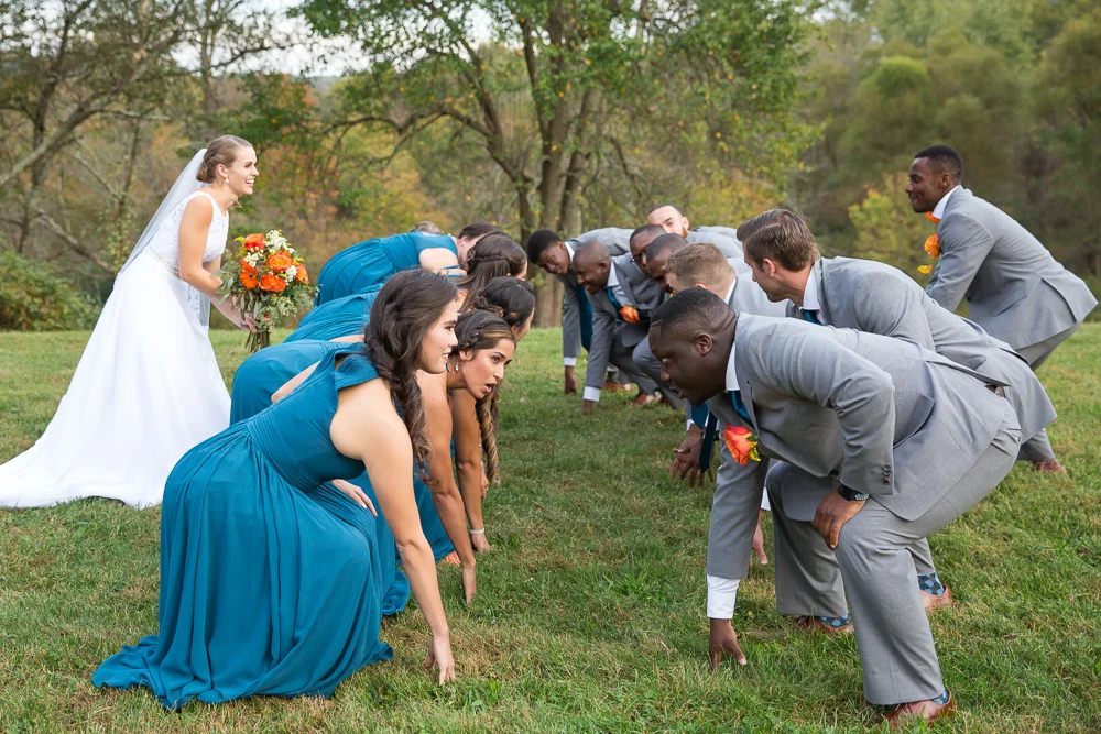 Football pose for wedding party photo | Fun Wedding Photographer in Culpeper, Virginia